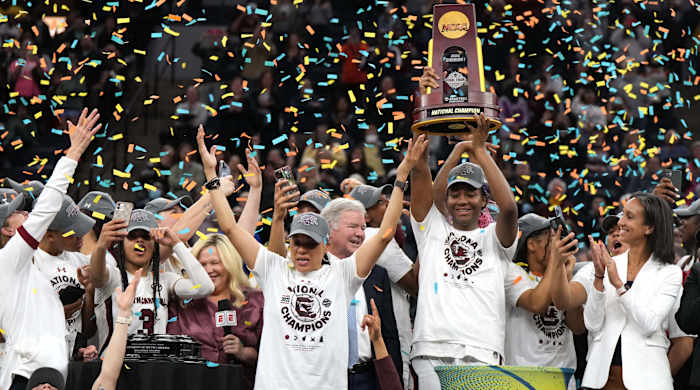 Dawn Staley and Aliyah Boston celebrate South Carolina’s national championship win in 2022.